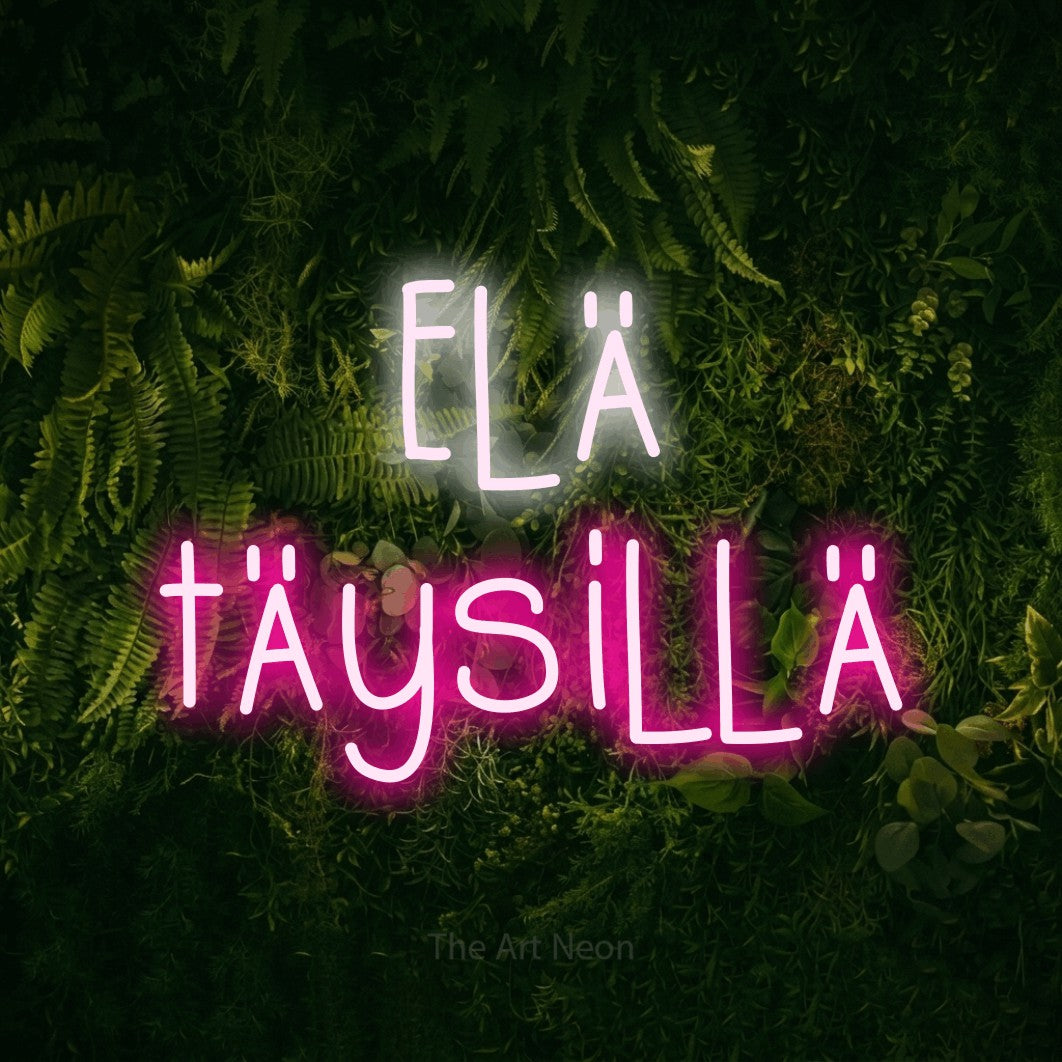 LED neon sign reading “Elä täysillä”, arranged in 2 lines.