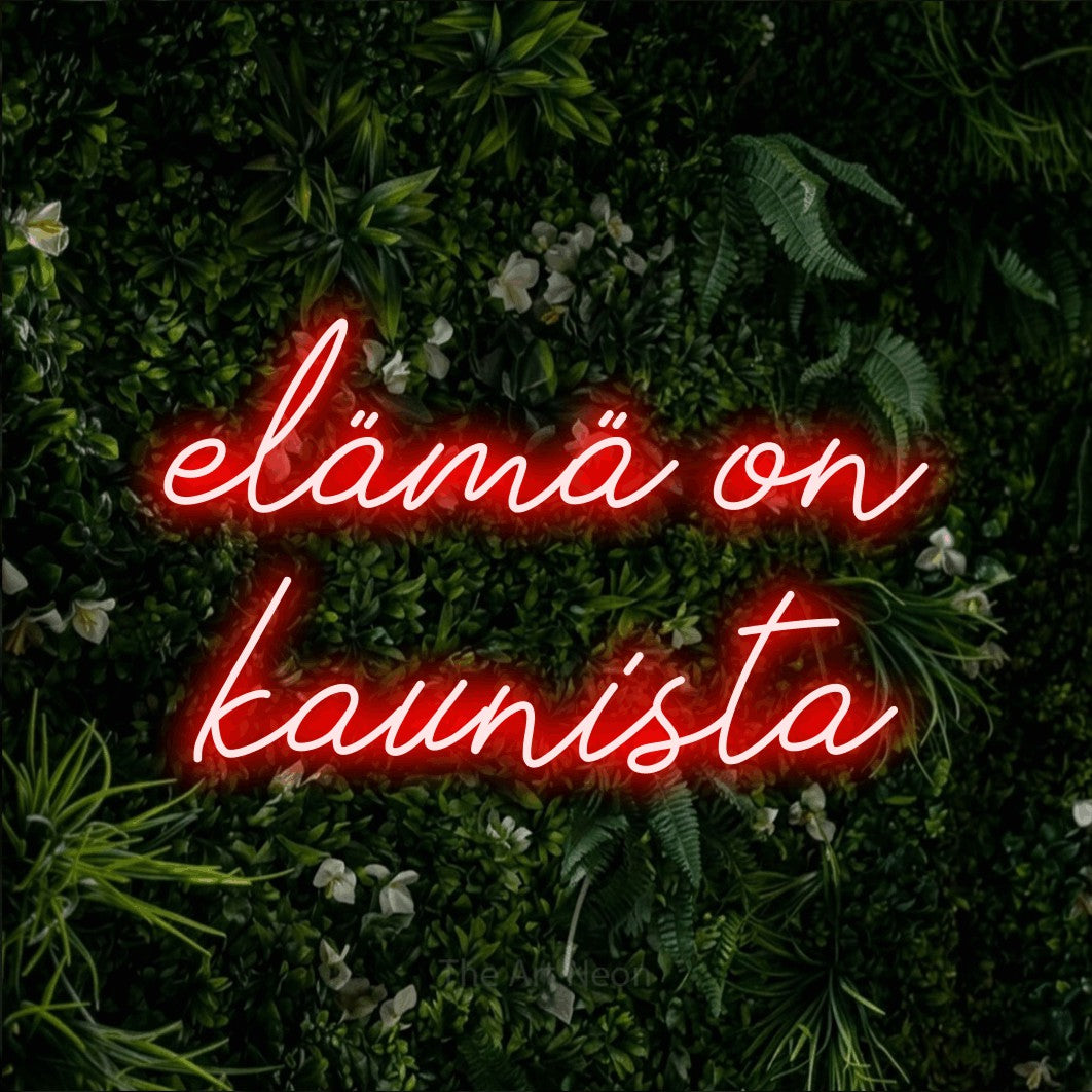 LED neon sign reading “elämä on kaunista”, arranged in 2 lines.