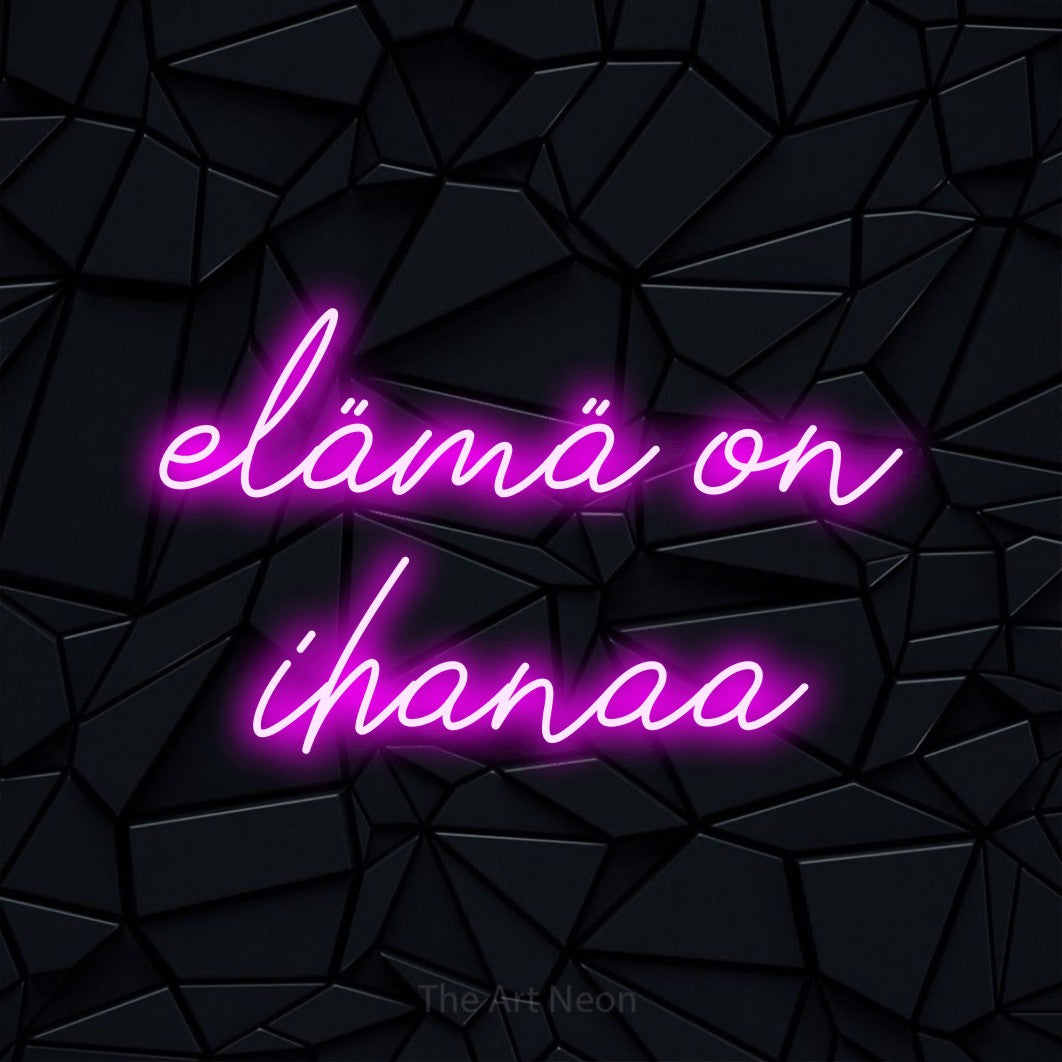 LED neon sign reading “elämä on ihanaa”, arranged in 2 lines.