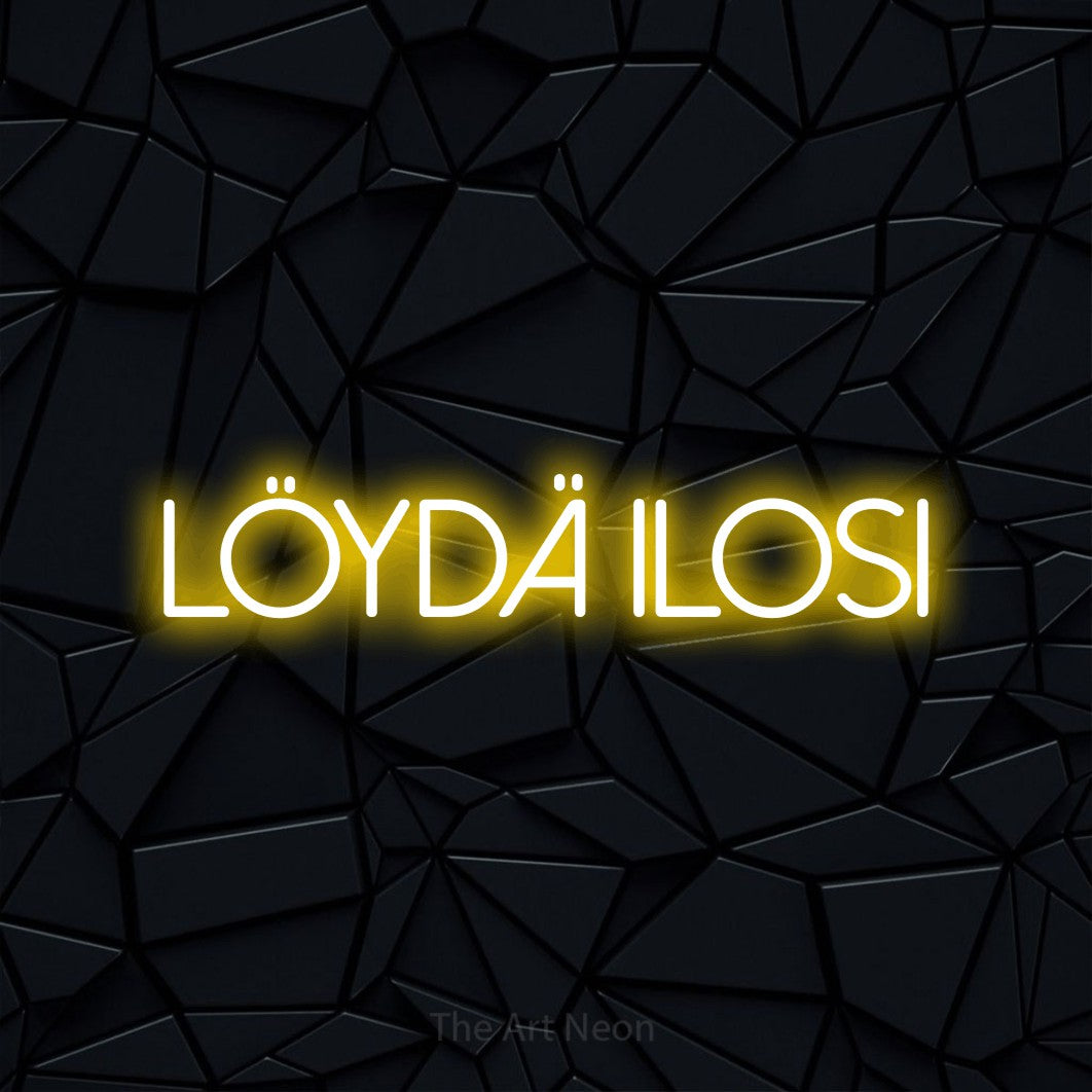 LED neon sign reading “Löydä ilosi”, arranged in a single line.