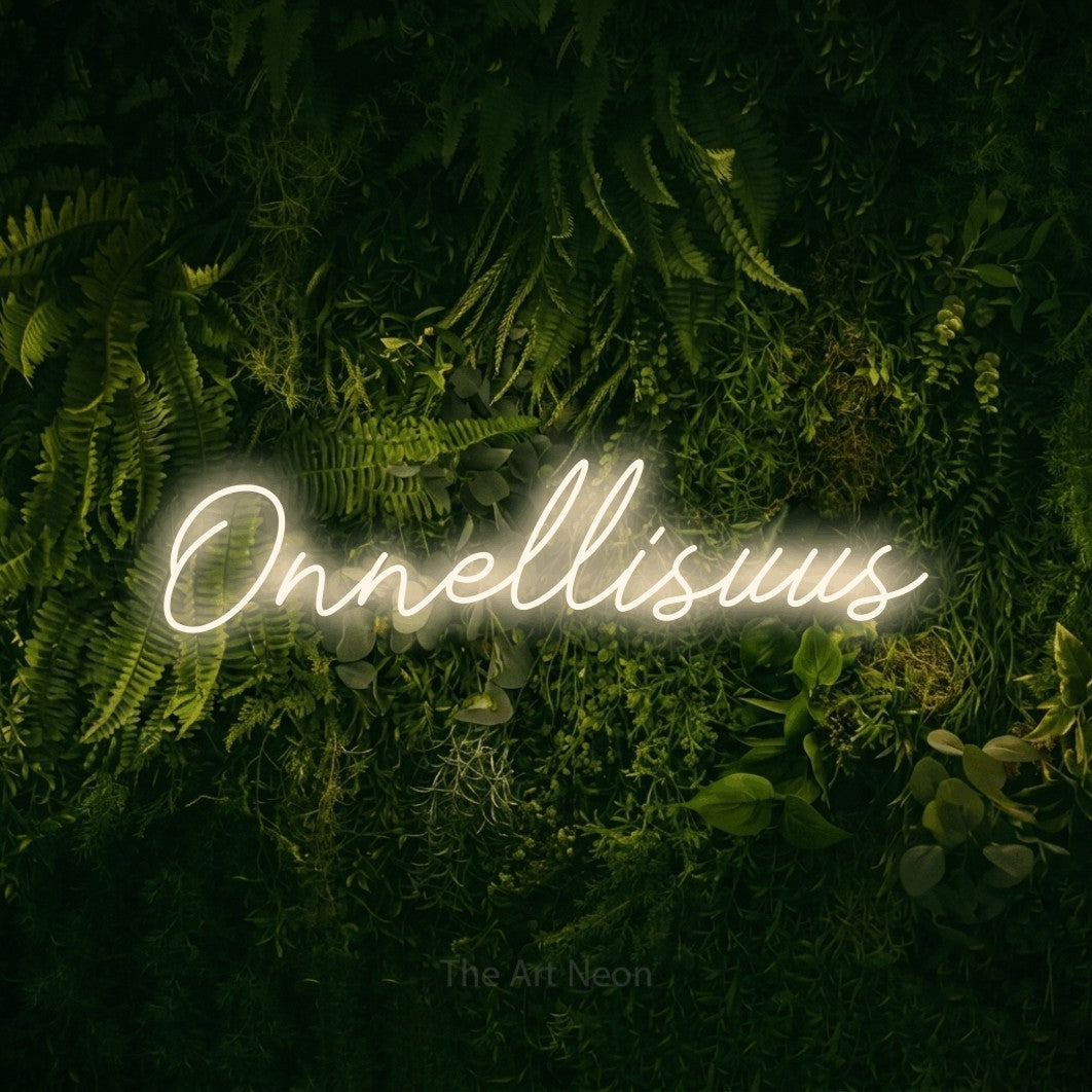 LED neon sign reading “Onnellisuus”, arranged in a single line.