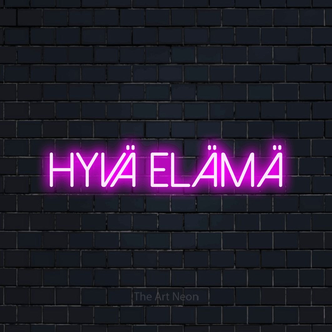 LED neon sign reading “Hyvä elämä”, arranged in a single line.