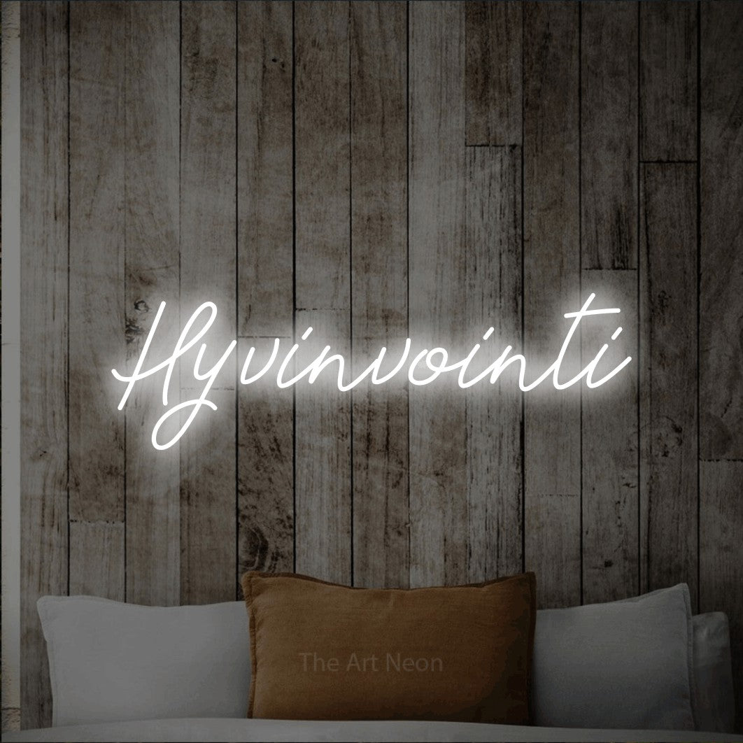 LED neon sign reading “Hyvinvointi”, arranged in a single line.