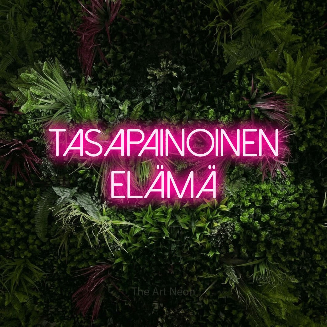 LED neon sign reading “tasapainoinen elämä”, arranged in 2 lines.