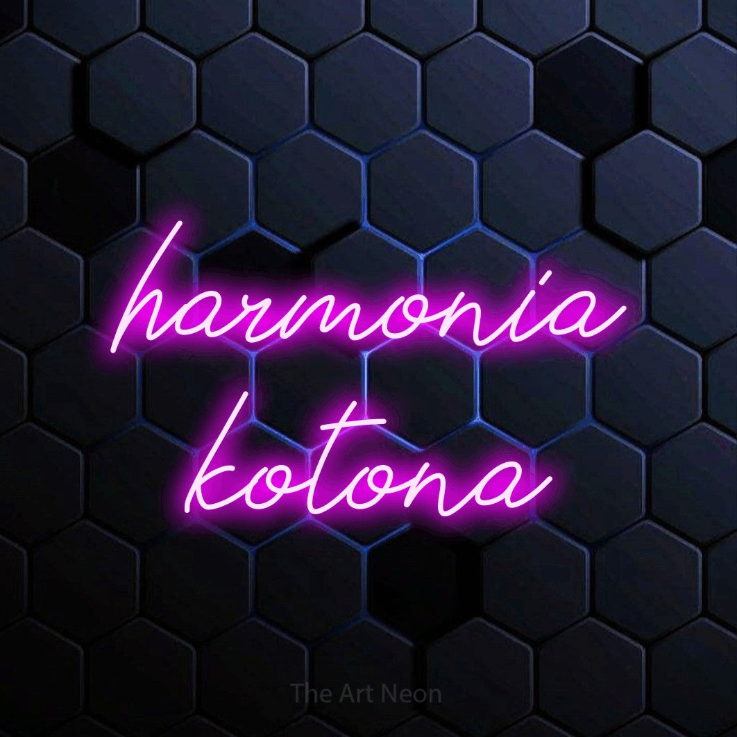 LED neon sign reading “harmonia kotona”, arranged in 2 lines.