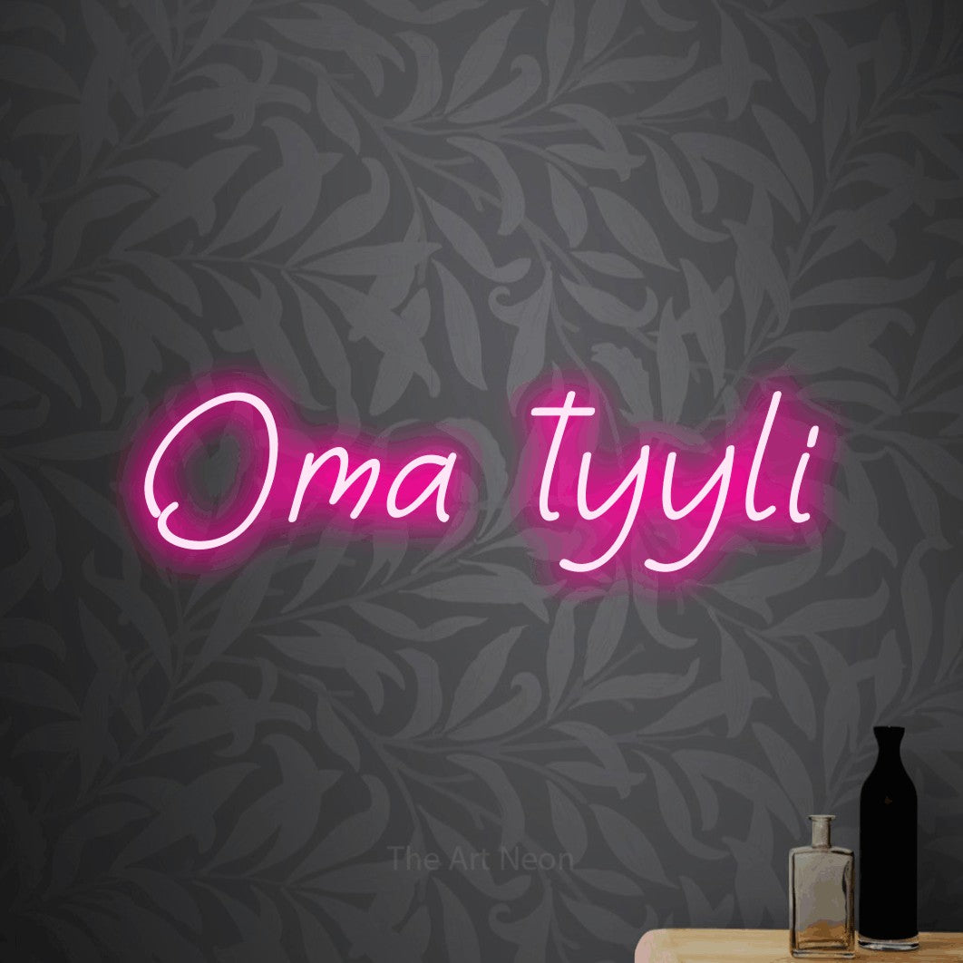 LED neon sign reading “Oma tyyli”, arranged in a single line.