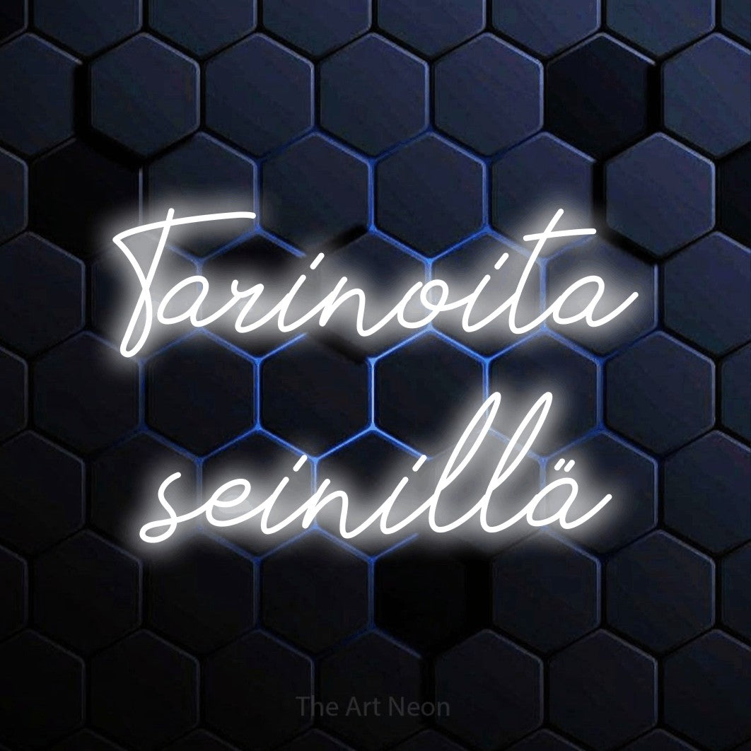 LED neon sign reading “Tarinoita seinillä”, arranged in 2 lines.