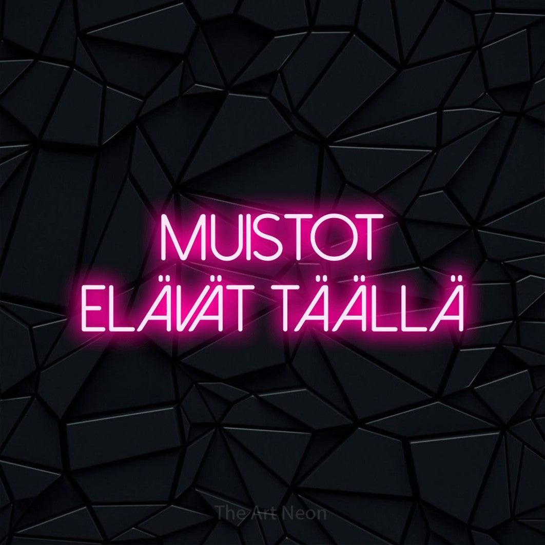 LED neon sign reading “Muistot elävät täällä”, arranged in 2 lines.