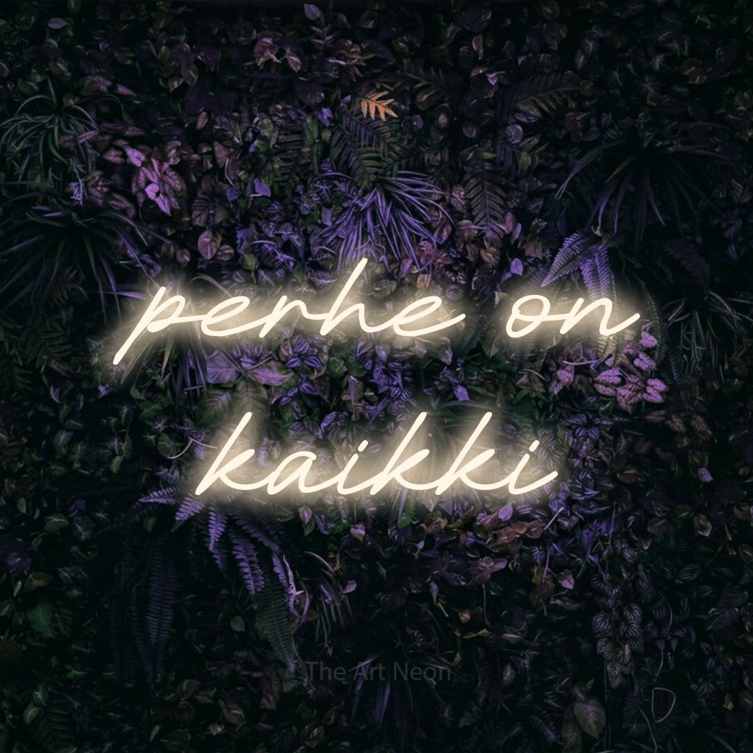 LED neon sign reading “perhe on kaikki”, arranged in 2 lines.