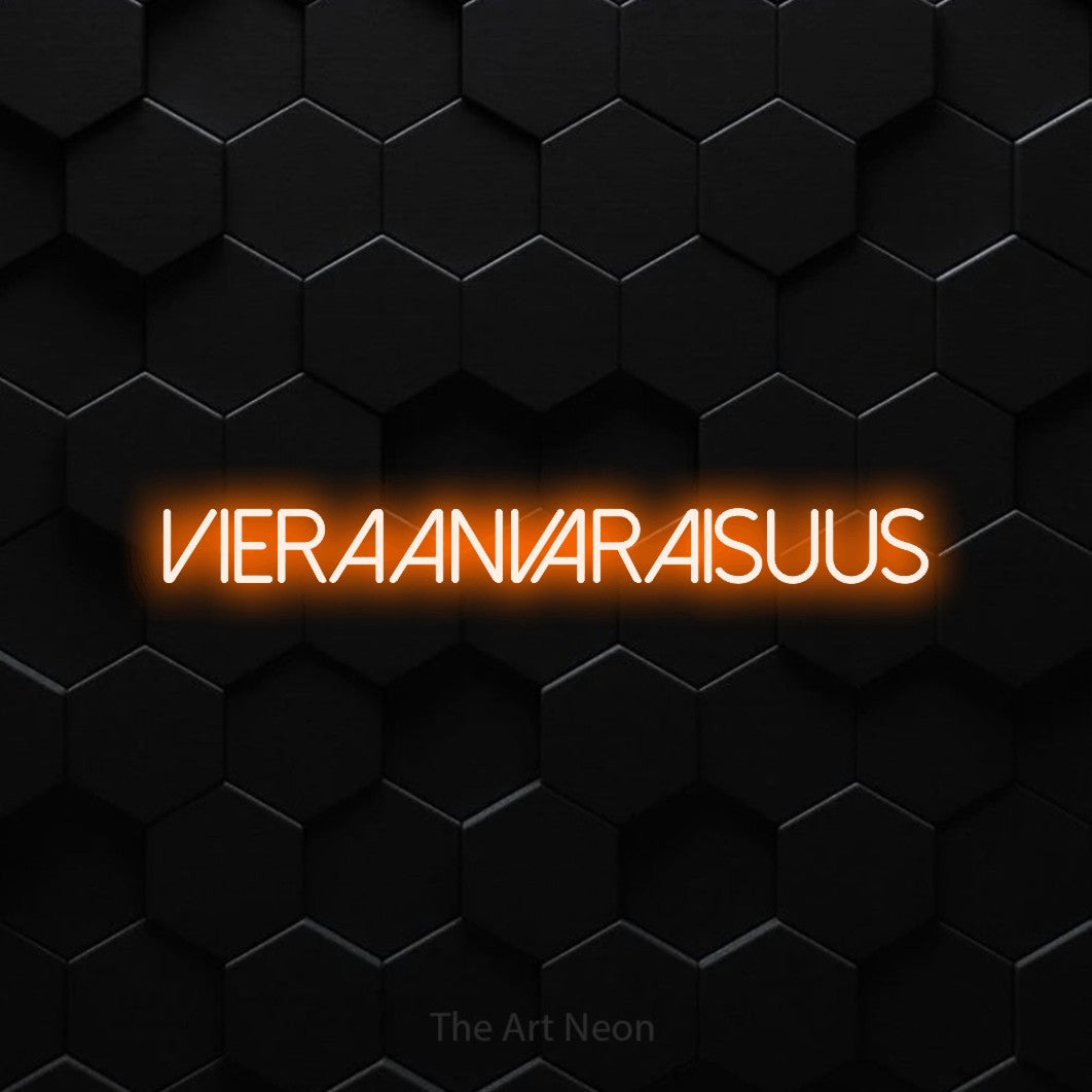 LED neon sign reading “VIERAANVARAISUUS”, arranged in a single line.