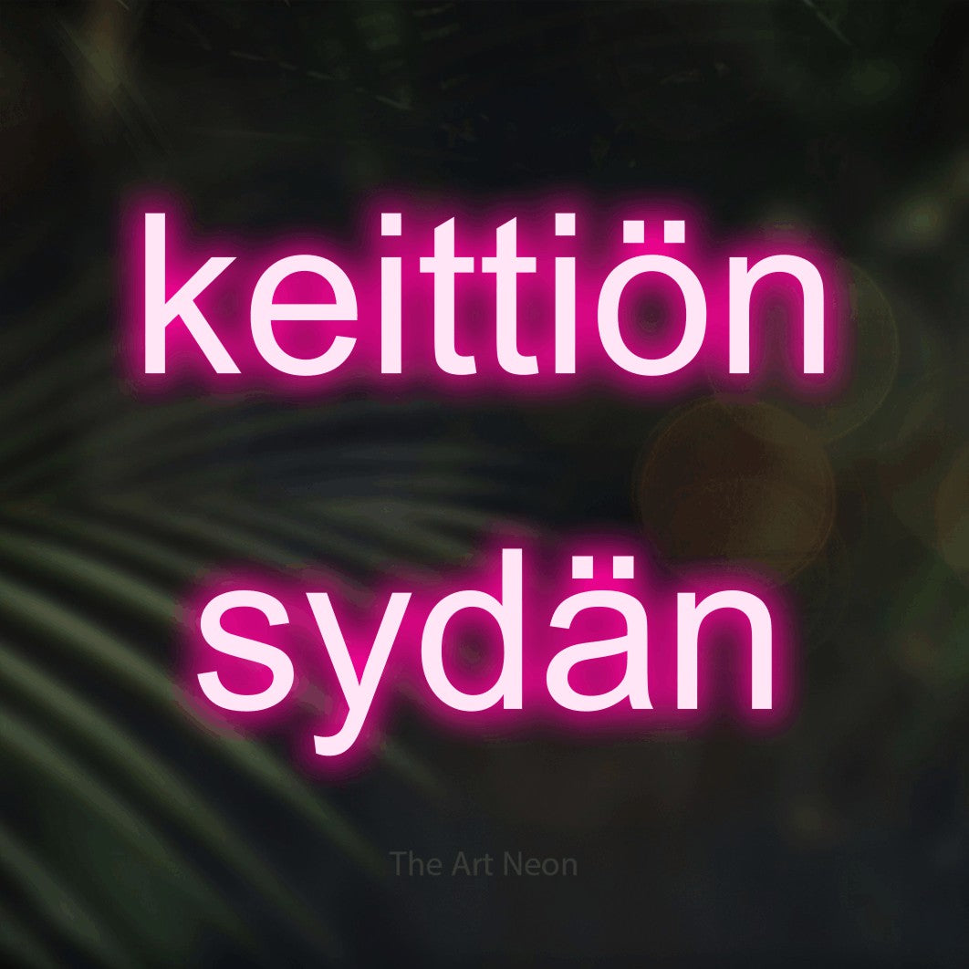 LED neon sign reading “keittiön sydän”, arranged in 2 lines.
