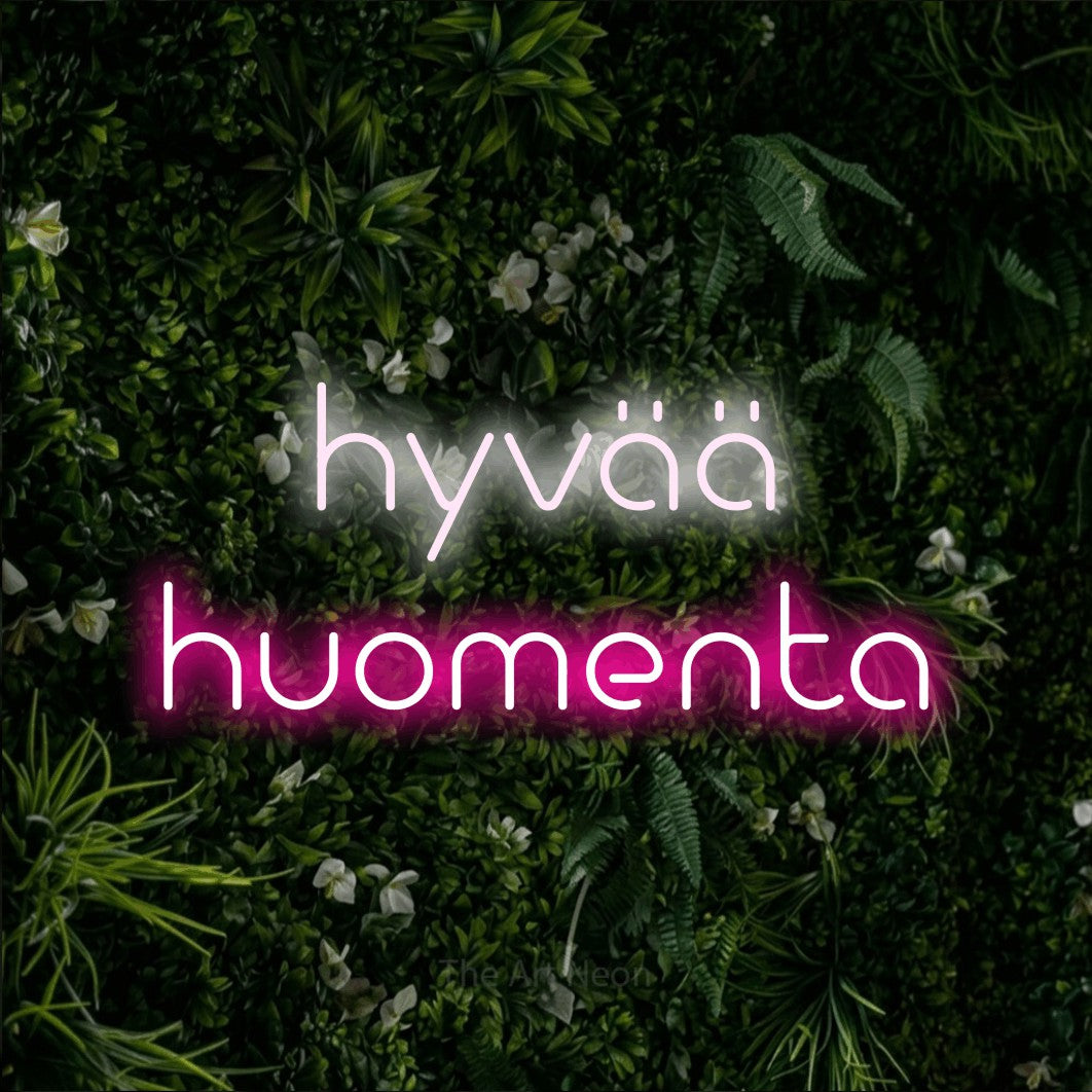 LED neon sign reading “hyvää huomenta”, arranged in 2 lines.