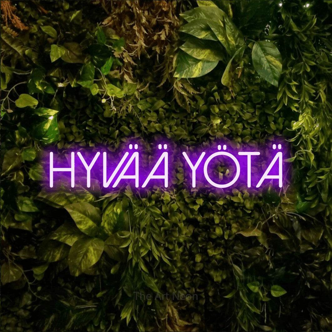 LED neon sign reading “Hyvää yötä”, arranged in a single line.