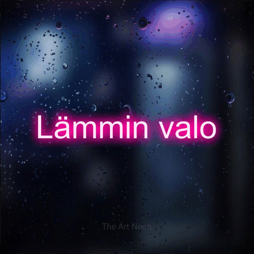 LED neon sign reading “Lämmin valo”, arranged in a single line.