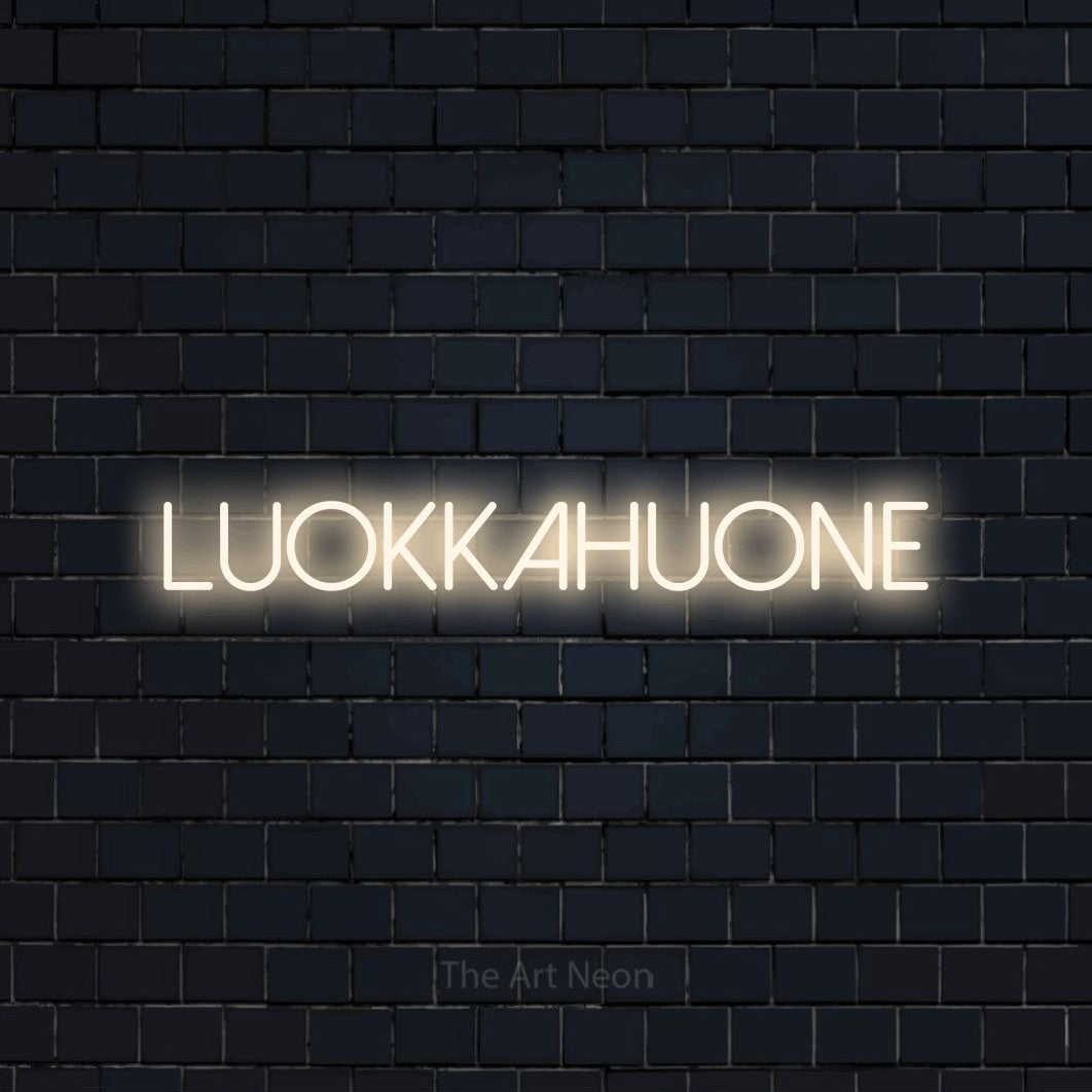 LED neon sign reading “LUOKKAHUONE”, arranged in a single line.