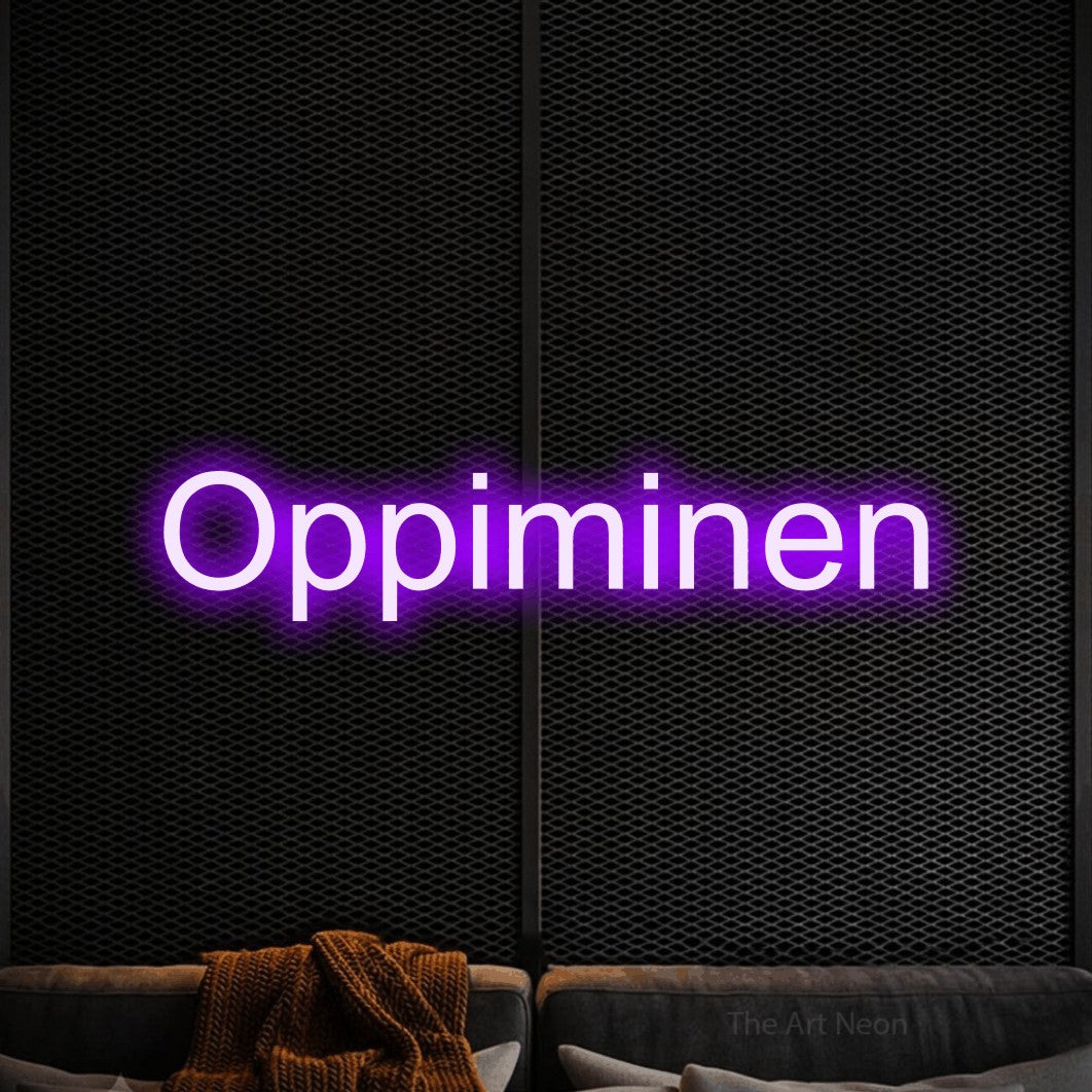 LED neon sign reading “Oppiminen”, arranged in a single line.