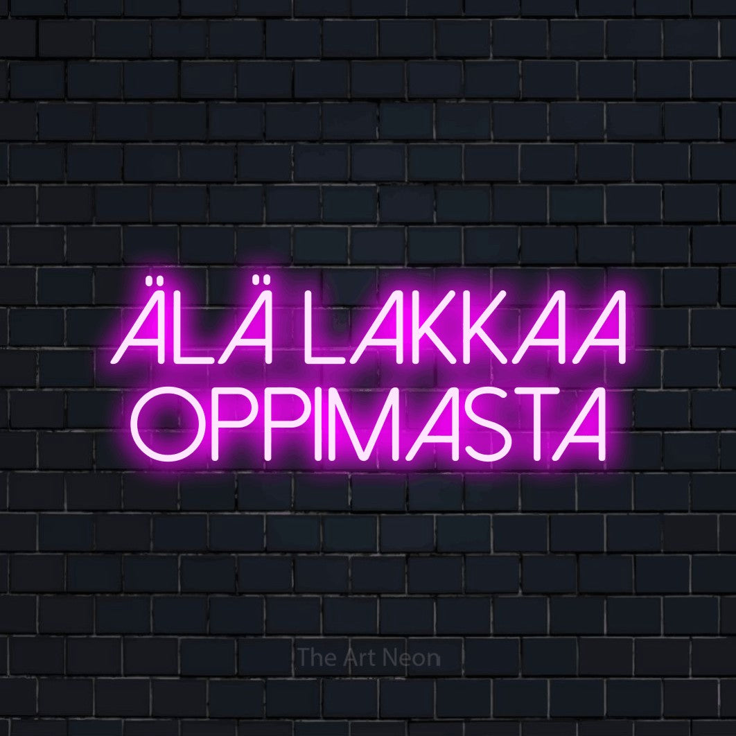 LED neon sign reading “Älä lakkaa oppimasta”, arranged in 2 lines.