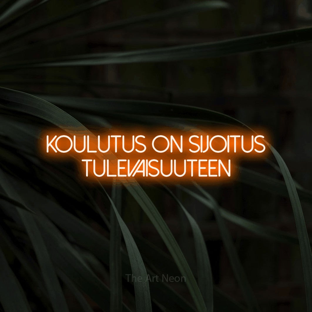 LED neon sign reading “koulutus on sijoitus tulevaisuuteen”, arranged in 2 lines.