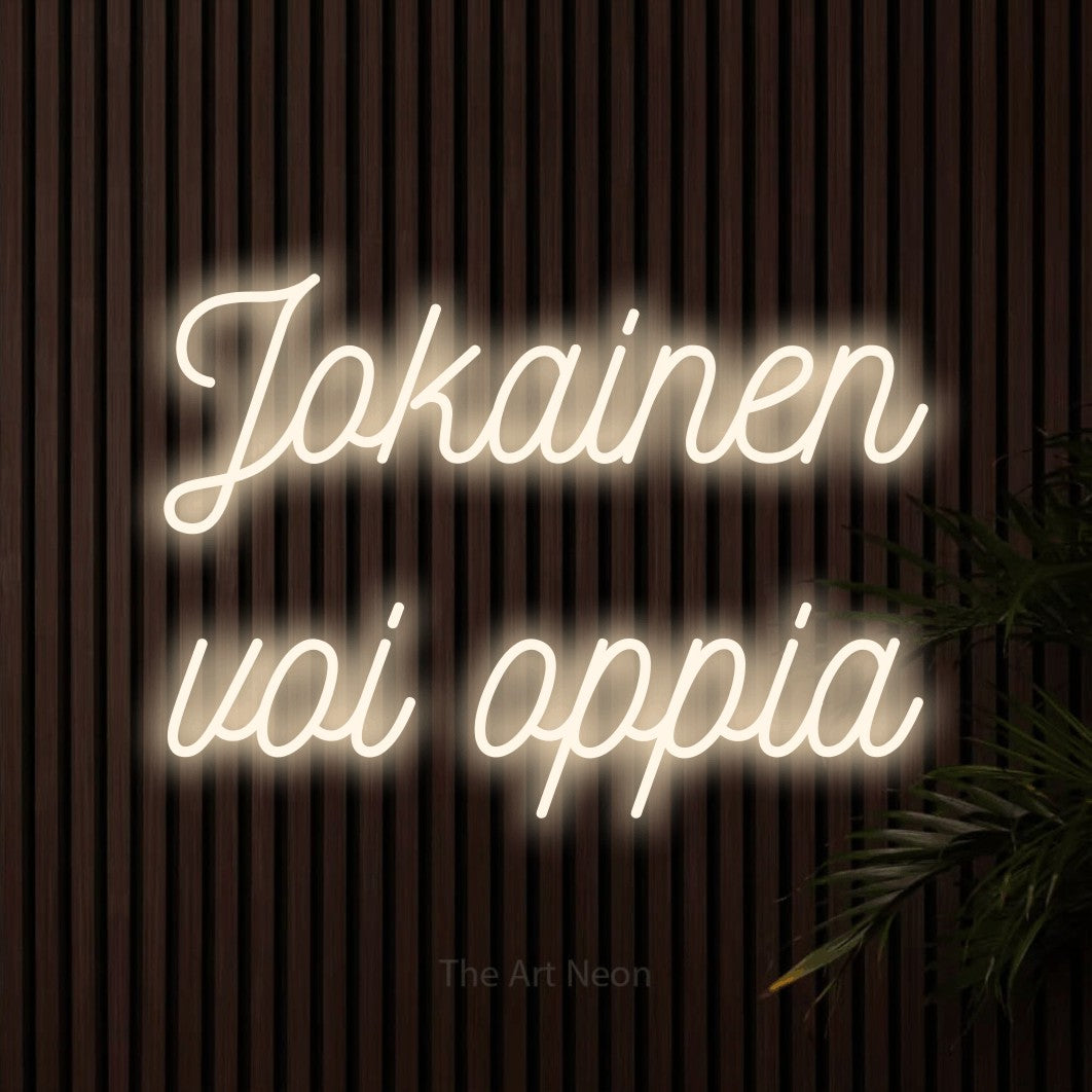 LED neon sign reading “Jokainen voi oppia”, arranged in 2 lines.