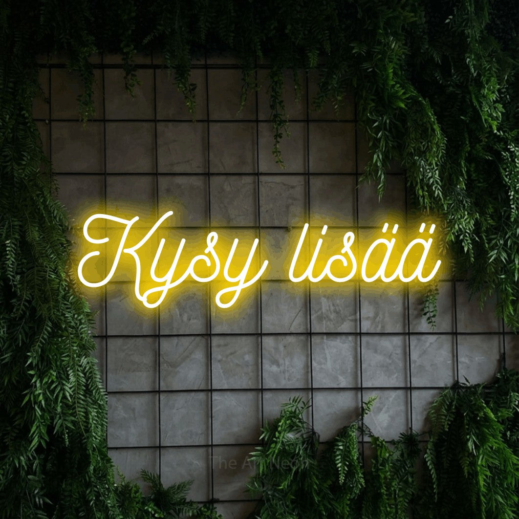 LED neon sign reading “Kysy lisää”, arranged in a single line.