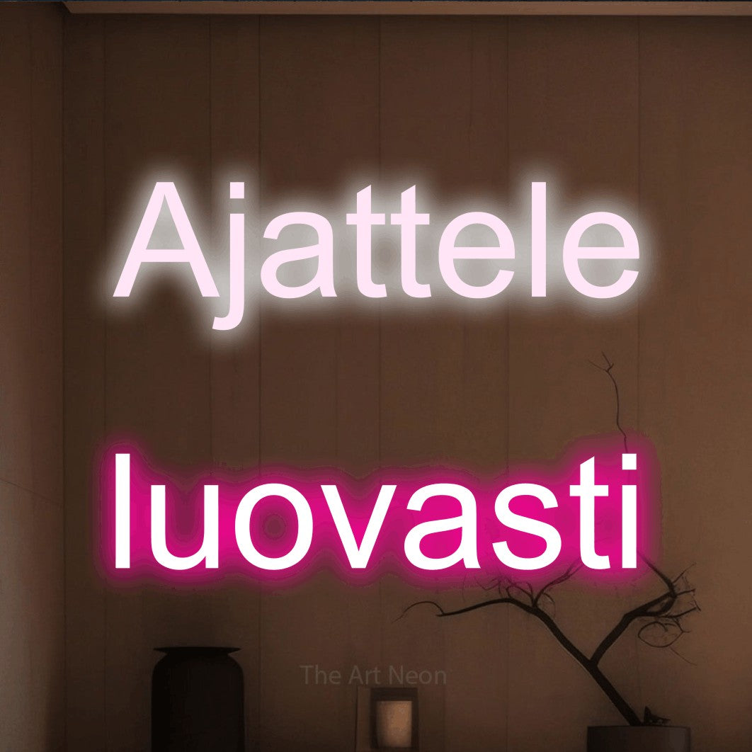 LED neon sign reading “Ajattele luovasti”, arranged in 2 lines.