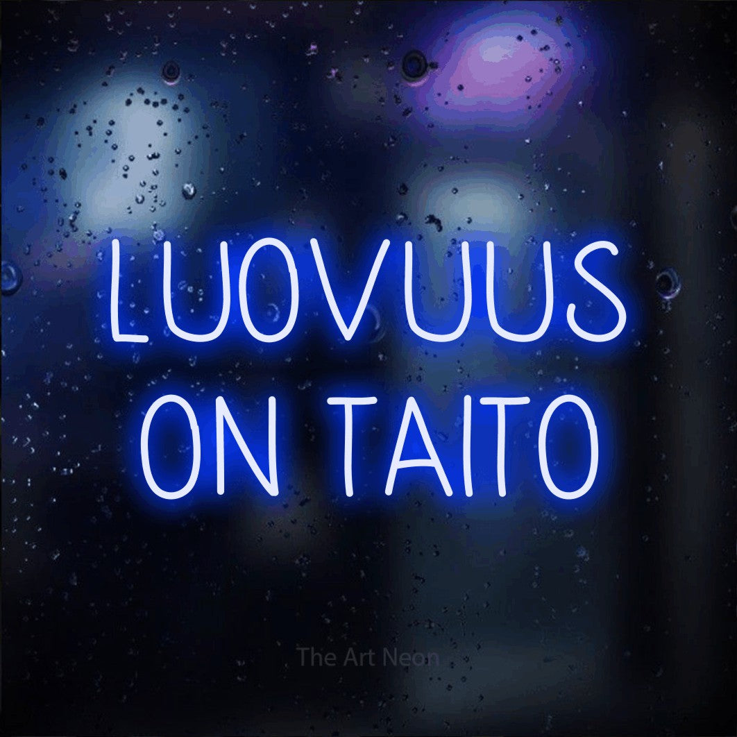 LED neon sign reading “LUOVUUS ON TAITO”, arranged in 2 lines.