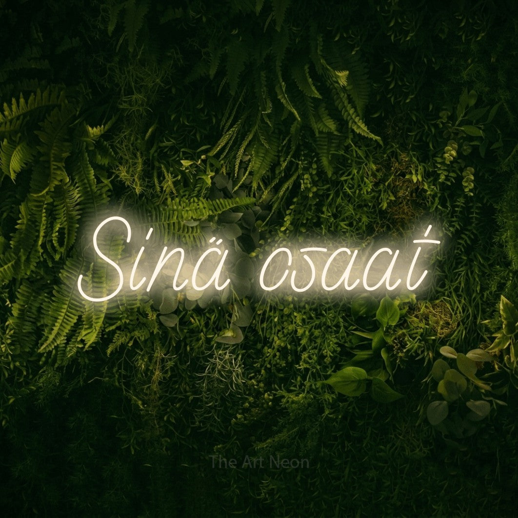 LED neon sign reading “Sinä osaat”, arranged in a single line.