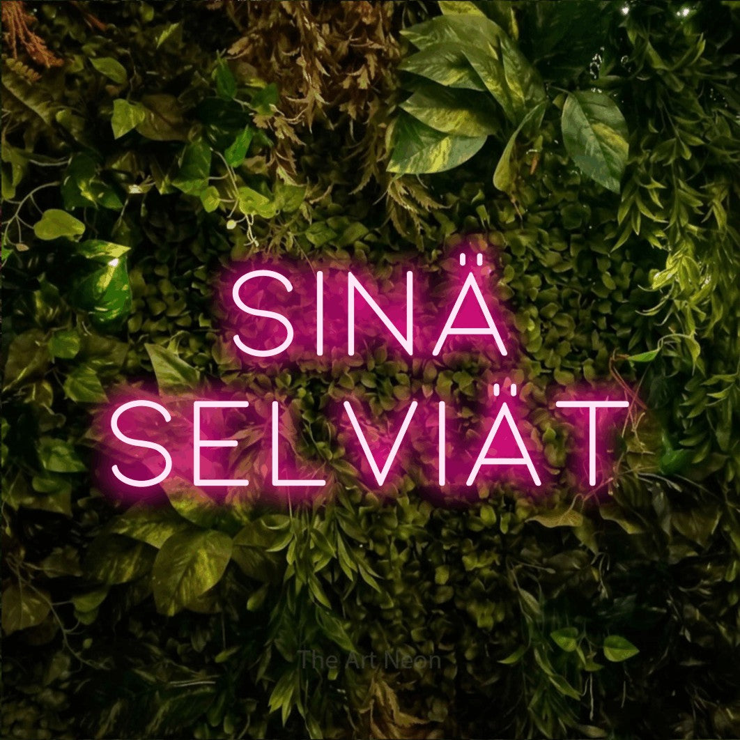 LED neon sign reading “sinä SELVIÄT”, arranged in 2 lines.