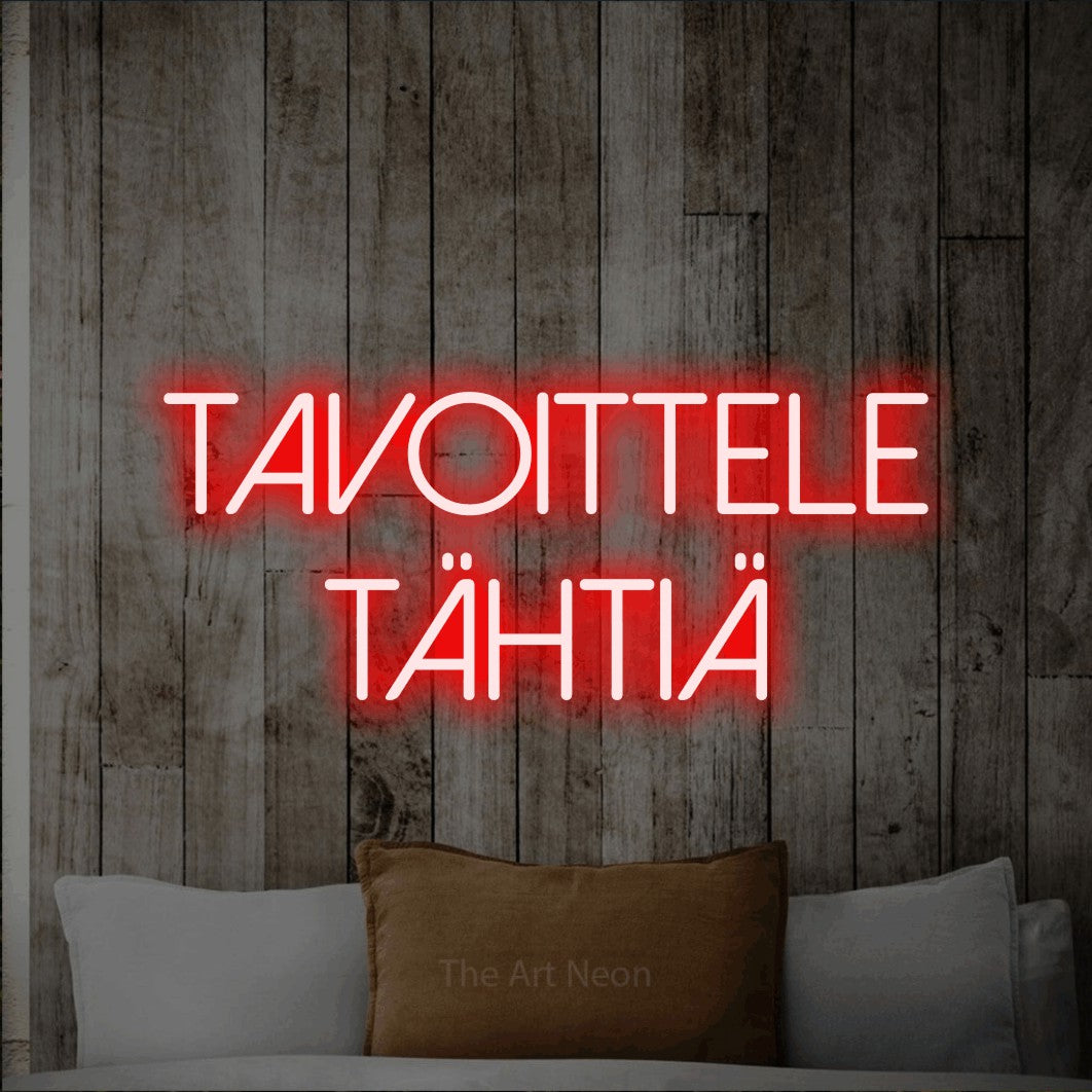 LED neon sign reading “tavoittele tähtiä”, arranged in 2 lines.