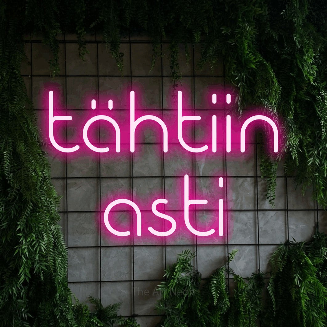 LED neon sign reading “tähtiin asti”, arranged in 2 lines.