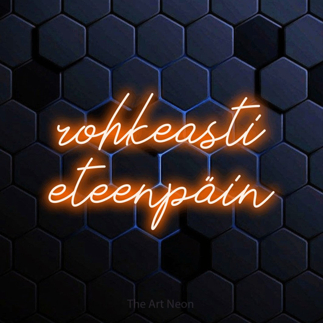 LED neon sign reading “rohkeasti eteenpäin”, arranged in 2 lines.