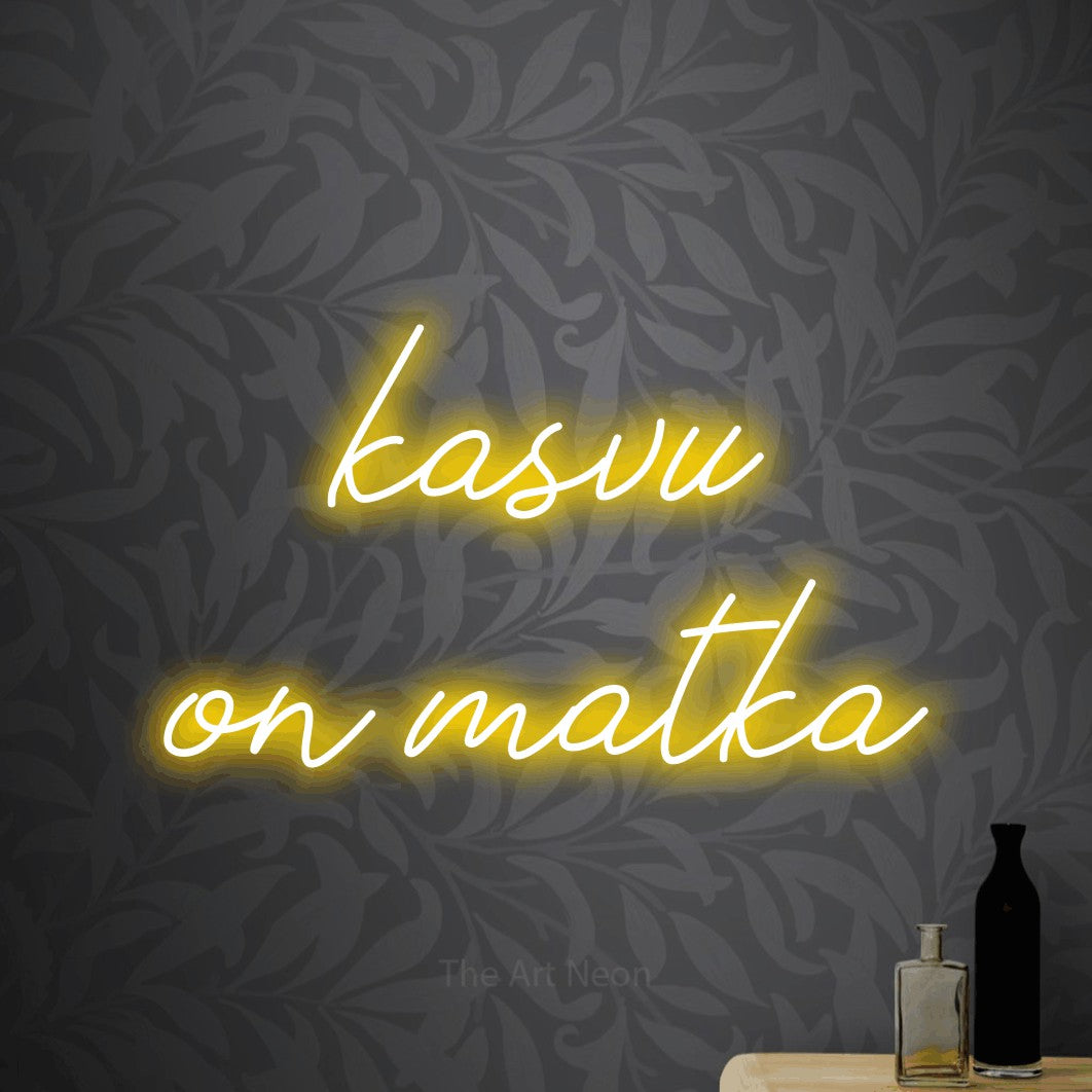 LED neon sign reading “kasvu on matka”, arranged in 2 lines.
