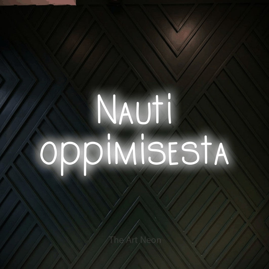 LED neon sign reading “Nauti oppimisesta”, arranged in 2 lines.