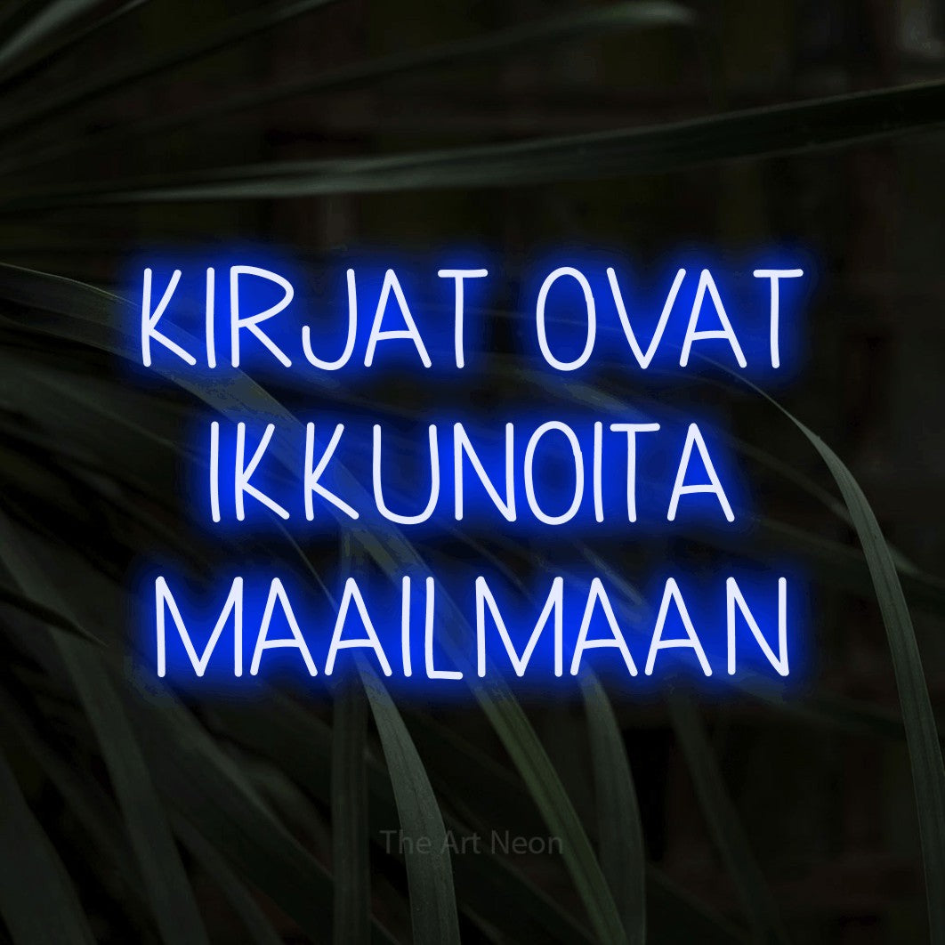 LED neon sign reading “KIRJAT OVAT IKKUNOITA MAAILMAAN”, arranged in 3 lines.