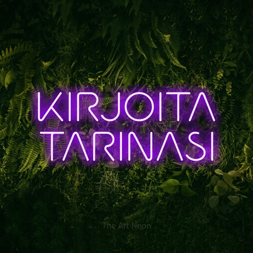 LED neon sign reading “KIRJOITA TARINASI”, arranged in 2 lines.