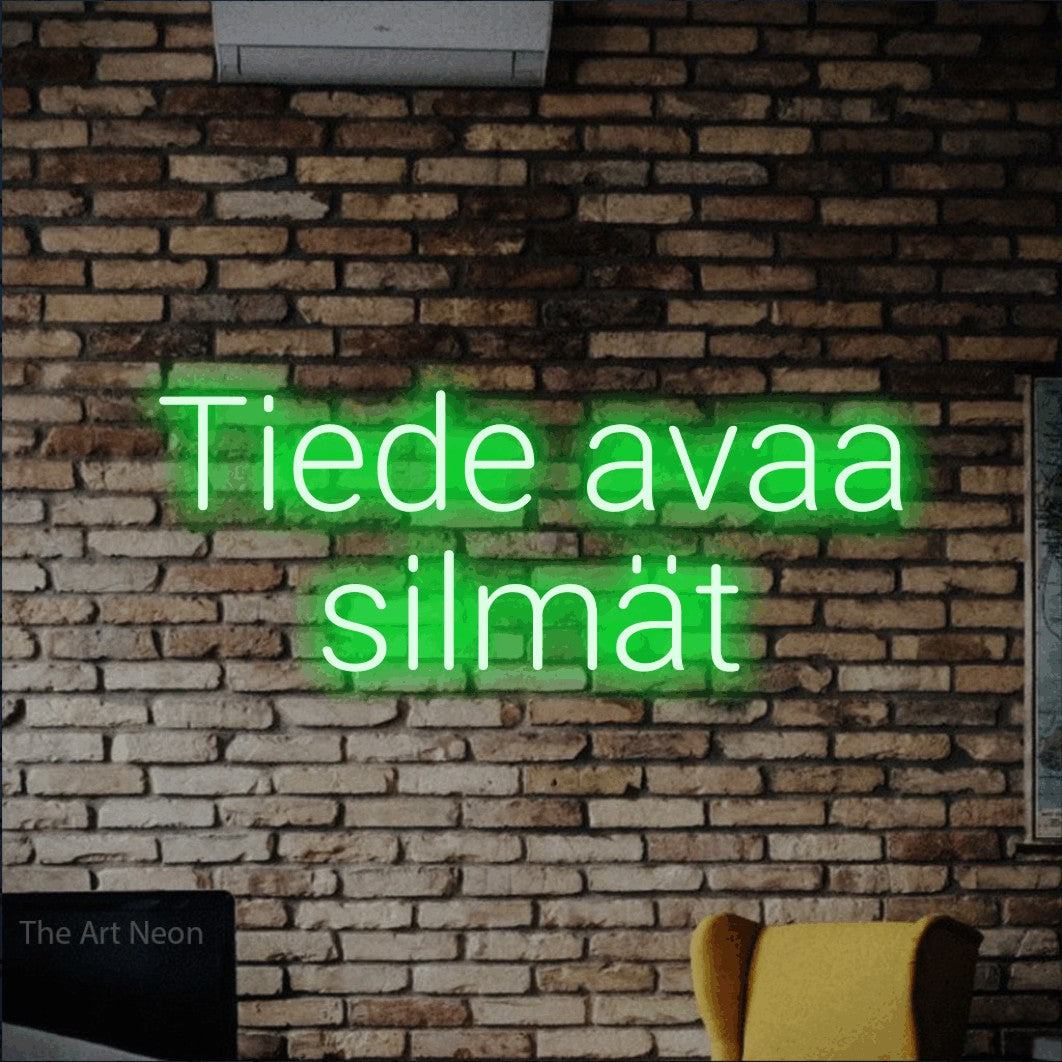 LED neon sign reading “Tiede avaa silmät”, arranged in 2 lines.