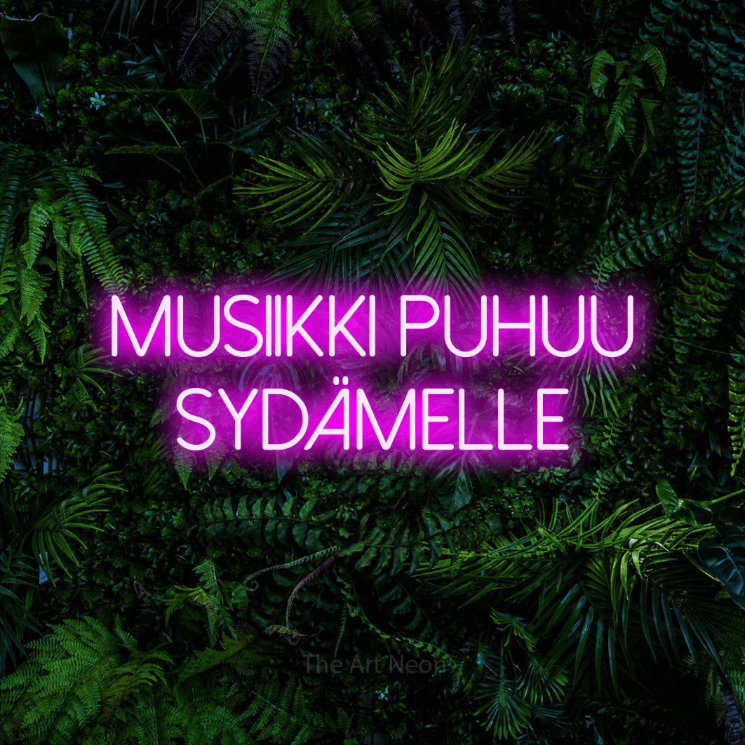LED neon sign reading “MUSIIKKI PUHUU SYDÄMELLE”, arranged in 2 lines.