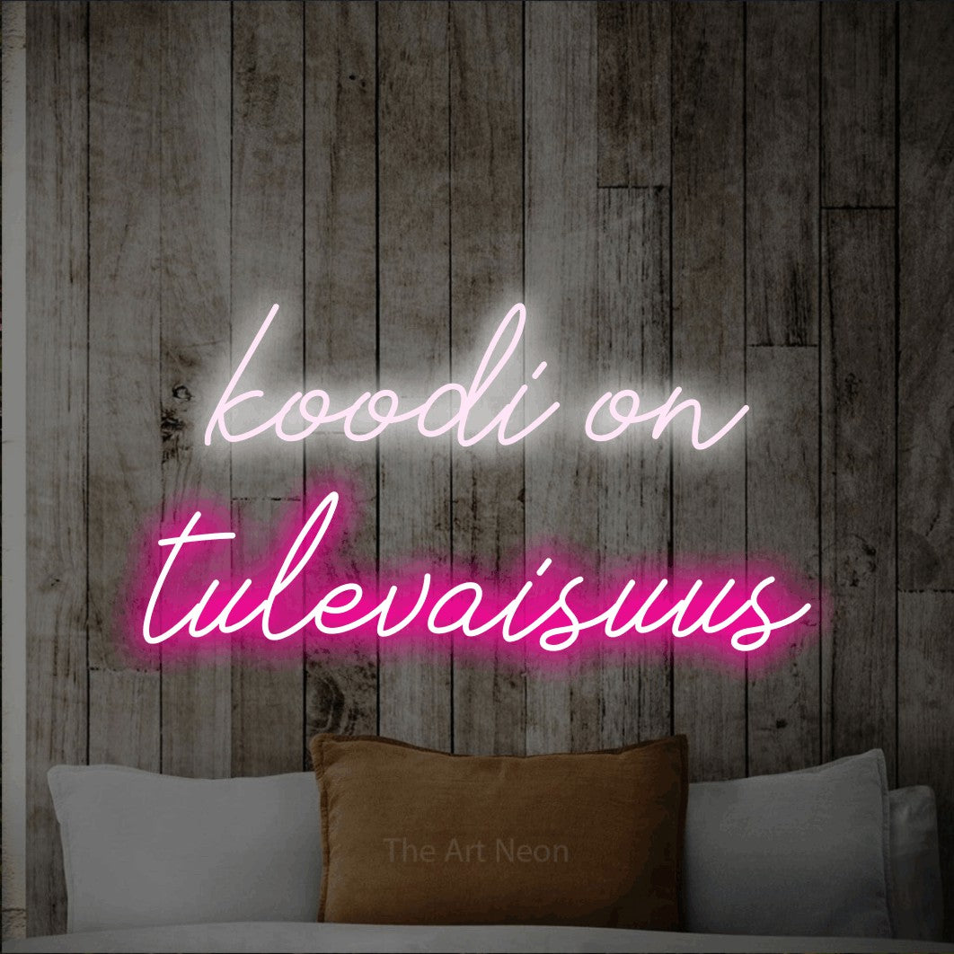 LED neon sign reading “koodi on tulevaisuus”, arranged in 2 lines.