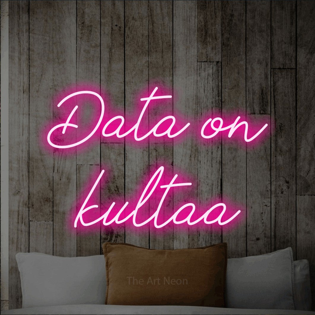 LED neon sign reading “Data on kultaa”, arranged in 2 lines.