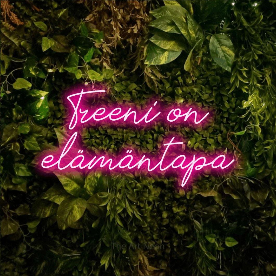 LED neon sign reading “Treeni on elämäntapa”, arranged in 2 lines.