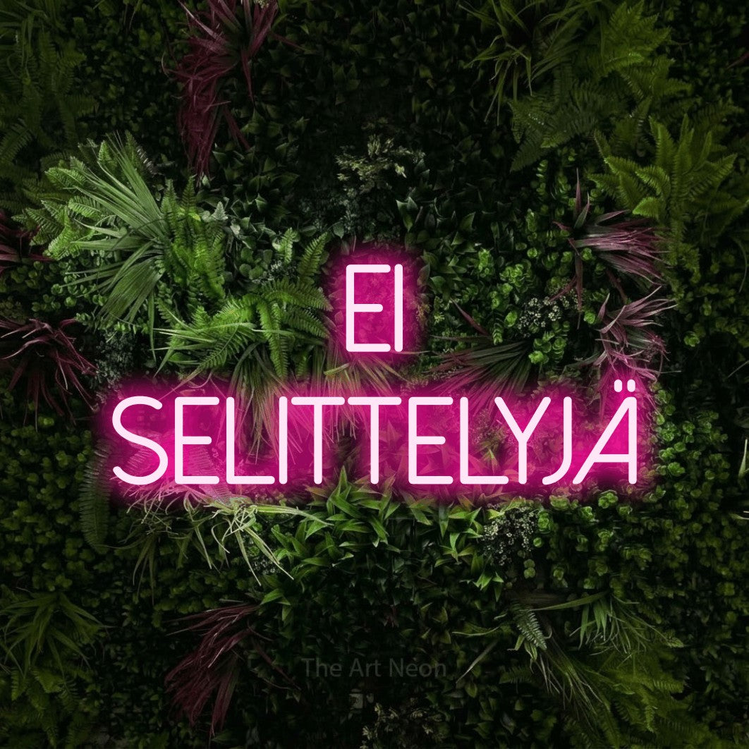 LED neon sign reading “EI SELITTELYJÄ”, arranged in 2 lines.
