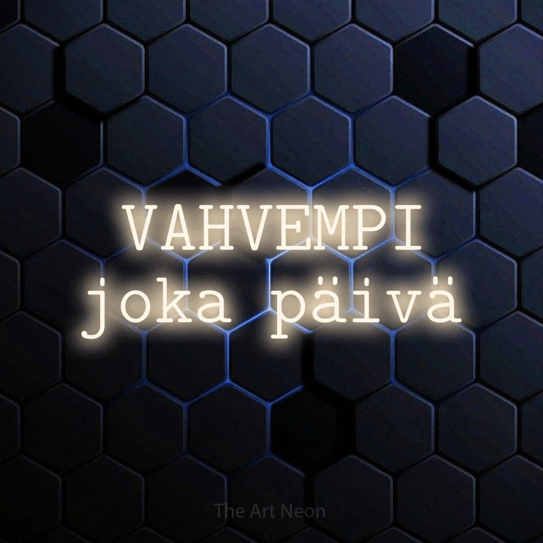 LED neon sign reading “VAHVEMPI joka päivä”, arranged in 2 lines.