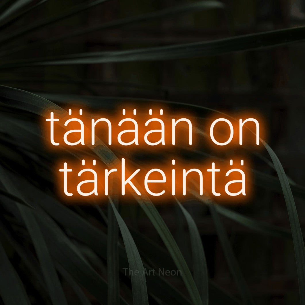 LED neon sign reading “tänään on tärkeintä”, arranged in 2 lines.