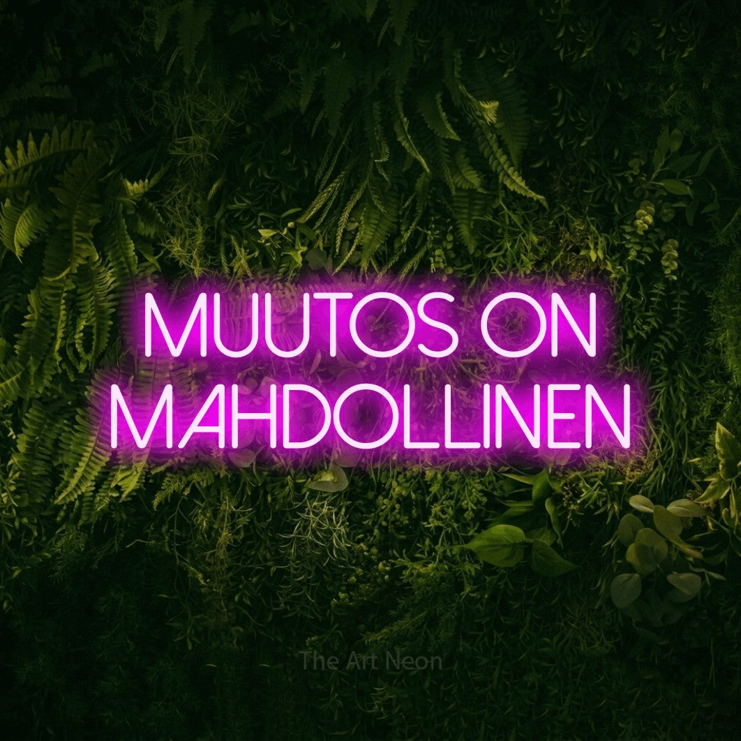 LED neon sign reading “MUUTOS ON MAHDOLLINEN”, arranged in 2 lines.