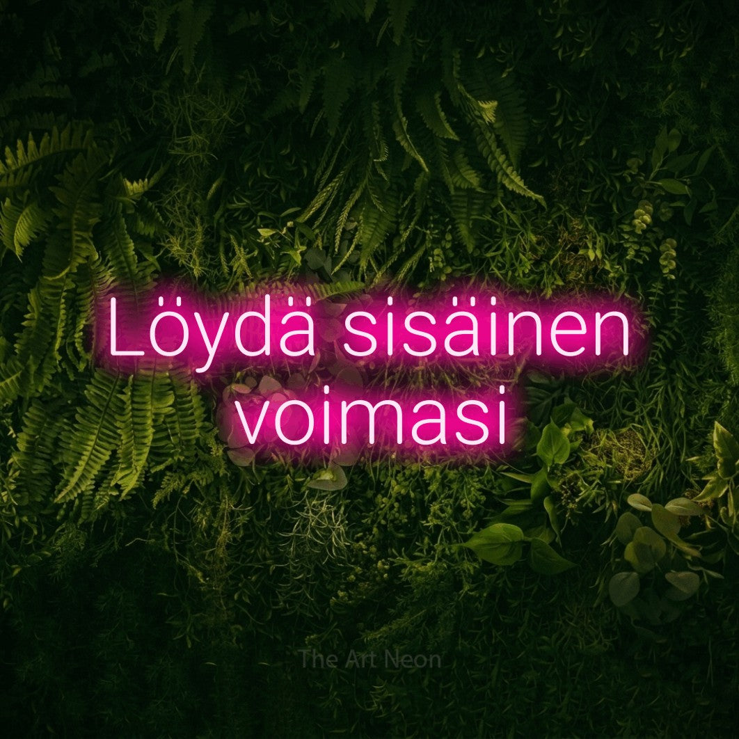 LED neon sign reading “Löydä sisäinen voimasi”, arranged in 2 lines.