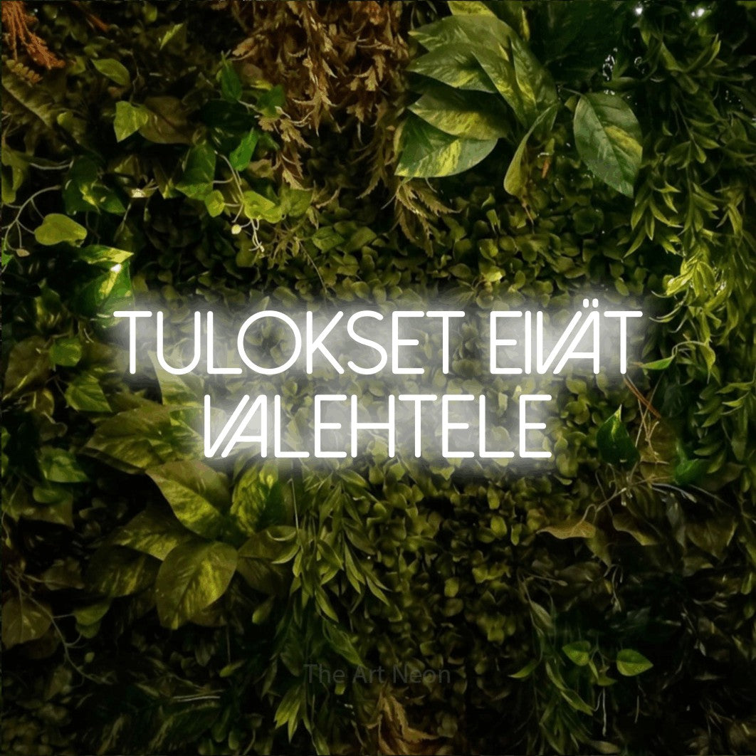 LED neon sign reading “TULOKSET EIVÄT VALEHTELE”, arranged in 2 lines.