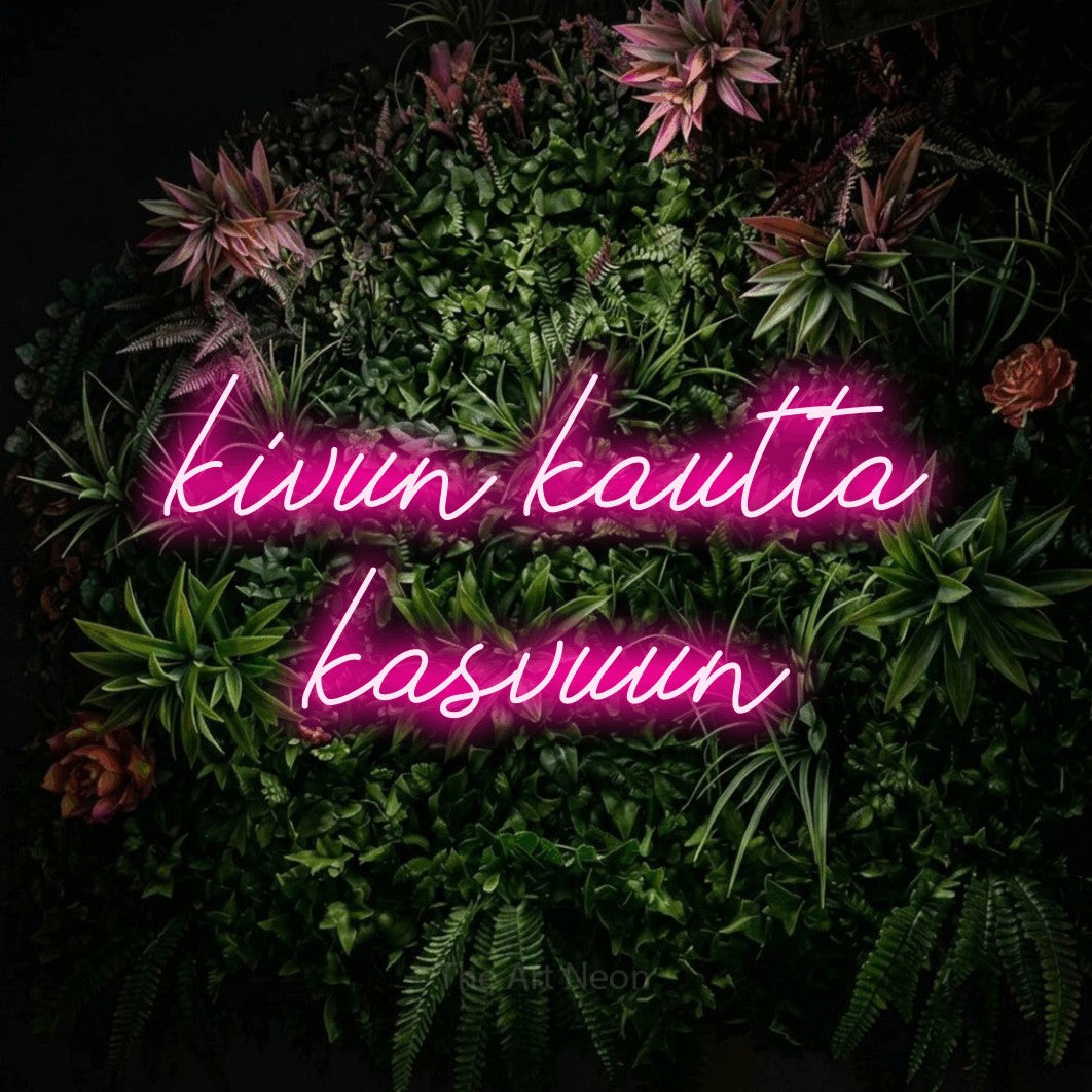 LED neon sign reading “kivun kautta kasvuun”, arranged in 2 lines.