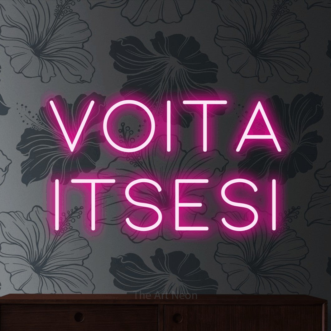 LED neon sign reading “Voita itsesi”, arranged in 2 lines.