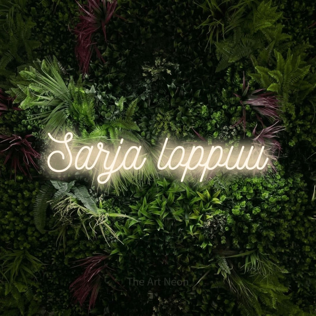 LED neon sign reading “Sarja loppuu”, arranged in a single line.
