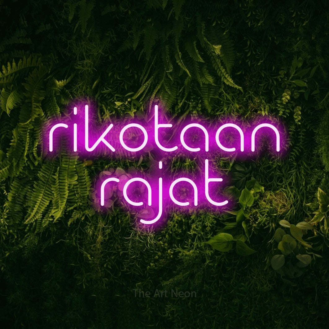 LED neon sign reading “rikotaan rajat”, arranged in 2 lines.